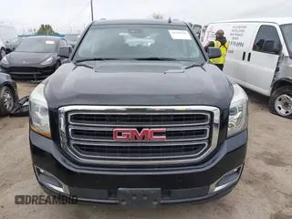 2015 GMC Yukon SLT with VIN 1GKS1BKC3FR129173, listed as a IAAI auction lot 41795585 with 97,893 mi miles. Bid and sale history available at carsss.com. Image 13.