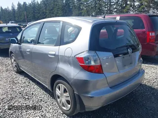 2010 Honda Fit with VIN JHMGE8H20AC010062, listed as a IAAI auction lot 41964011 with 104,651 mi miles. Bid and sale history available at carsss.com. Image 3.