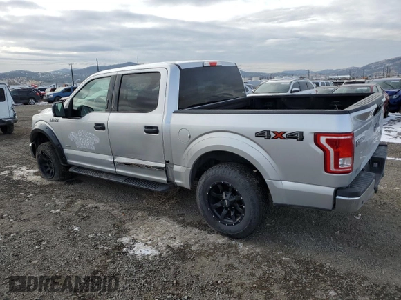 2015 Ford F-150 XLT with VIN 1FTEW1EG1FFA90068, listed as a Copart auction lot 84421594 with 150,386 mi miles and Salvage title. Bid and sale history available at DreamBid. Image 2.