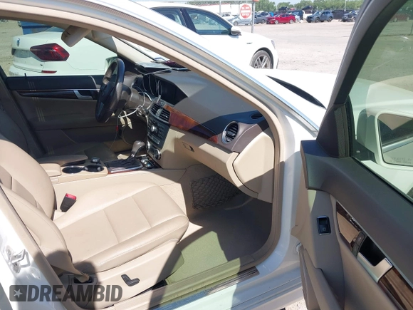 2014 Mercedes-Benz C 250 Sport with VIN WDDGF4HBXEG220311, listed as a IAAI auction lot 42540794 with 203,813 mi miles and . Bid and sale history available at DreamBid. Image 5.