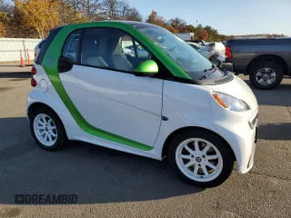 2016 Smart fortwo Passion with VIN WMEEJ9AA7GK842929, listed as a Copart auction lot 77001654 with 47,940 mi miles and Clean title. Bid and sale history available at DreamBid. Image 4.