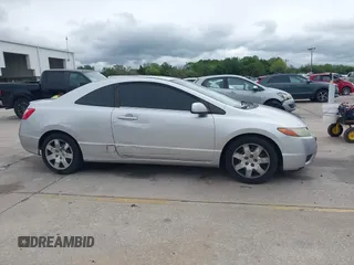 2006 Honda Civic Cpe LX with VIN 2HGFG12606H568106, listed as a IAAI auction lot 41983712 with 196,957 mi miles. Bid and sale history available at carsss.com. Image 13.