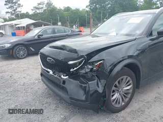 2024 Mazda CX-90 Preferred z VIN JM3KKBHD6R1118705, wystawiony jako IAAI lot #42135120 z przebiegiem 23 347 mil mil oraz . Historia ofert i sprzedaży dostępna na DreamBid. Obrazek 12.