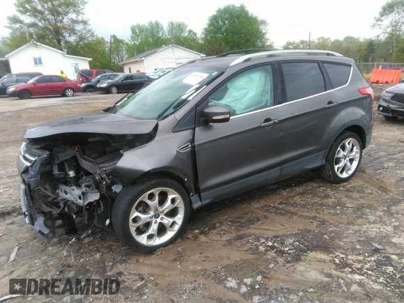2013 Ford Escape Titanium with VIN 1FMCU0J92DUC70534, listed as a IAAI auction lot 41967096 with 77,921 mi miles and . Bid and sale history available at carsss.com. Image 2.
