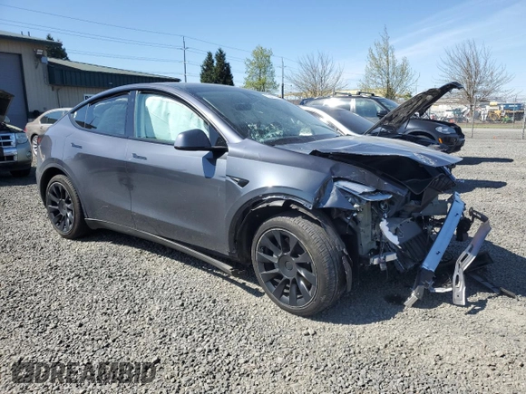 2022 Tesla Model Y Long Range z VIN 7SAYGDEE5NF367885, wystawiony jako Copart lot #52944795 z przebiegiem Nie podano mil oraz Szkoda całkowita • Salvage title. Historia ofert i sprzedaży dostępna na DreamBid. Obrazek 4.