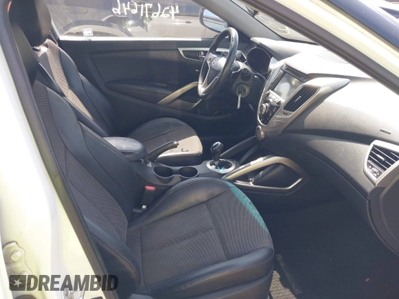 2013 Hyundai Veloster w/Black Int with VIN KMHTC6AD2DU131983, listed as a IAAI auction lot 42671646 with 131,731 mi miles and . Bid and sale history available at DreamBid. Image 5.