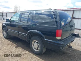 1997 Oldsmobile Bravada z VIN 1GHDT13W3V2707243, wystawiony jako IAAI lot #42024114 z przebiegiem 185 219 mil mil oraz . Historia ofert i sprzedaży dostępna na DreamBid. Obrazek 3.