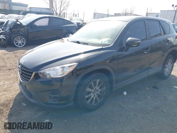 2016 Mazda CX-5 Sport with VIN JM3KE4BY3G0843177, listed as a IAAI auction lot 41804094 with 193,461 mi miles. Bid and sale history available at carsss.com. Image 17.