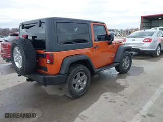 2011 Jeep Wrangler Sport with VIN 1J4AA2D16BL589390, listed as a IAAI auction lot 41478801 with 153,013 mi miles. Bid and sale history available at carsss.com. Image 4.