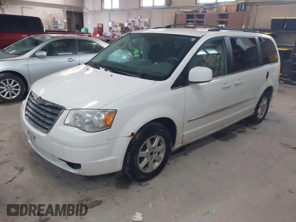 2010 Chrysler Town & Country Touring with VIN 2A4RR5D10AR369617, listed as a IAAI auction lot 42158748 with 174,437 mi miles and . Bid and sale history available at DreamBid. Image 2.