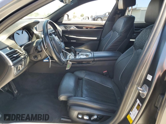 2018 BMW 7 Series 740i with VIN WBA7E2C59JG742809, listed as a Copart auction lot 66995934 with 62,017 mi miles and Salvage Title. Bid and sale history available at carsss.com. Image 7.