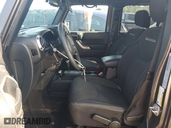 2016 Jeep Wrangler Unlimited Sahara с VIN 1C4BJWEG5GL221827, выставлен на аукционе Copart как лот 60411625 с пробегом 65 405 миль миль и Списание • Salvage title. История ставок и продаж доступна на DreamBid. Изображение 7.