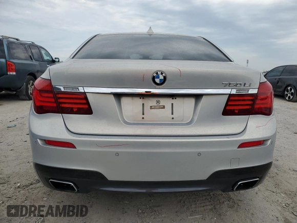 2015 BMW 7 Series 750Li z VIN WBAYE8C56FD781213, wystawiony jako Copart lot #55843955 z przebiegiem 63 899 mil mil oraz Szkoda całkowita • Salvage title. Historia ofert i sprzedaży dostępna na DreamBid. Obrazek 6.