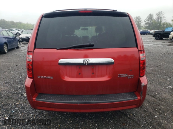 2010 Dodge Grand Caravan SXT z VIN 2D4RN5D10AR179773, wystawiony jako Copart lot #56855235 z przebiegiem 239 925 mil mil oraz Nie do naprawy • Non repairable. Historia ofert i sprzedaży dostępna na DreamBid. Obrazek 6.