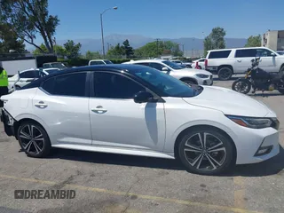 2021 Nissan Sentra SR z VIN 3N1AB8DV0MY245835, wystawiony jako IAAI lot #42320378 z przebiegiem 100 949 mil mil oraz . Historia ofert i sprzedaży dostępna na DreamBid. Obrazek 14.