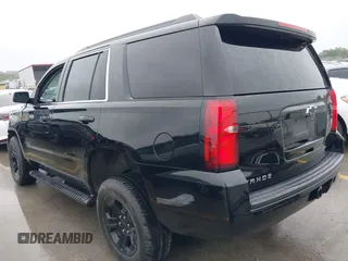 2020 Chevrolet Tahoe LS with VIN 1GNSCAKC5LR275173, listed as a IAAI auction lot 41931311 with 86,780 mi miles and . Bid and sale history available at DreamBid. Image 3.