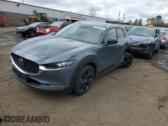 2023 Mazda CX-30 S Carbon Edition with VIN 3MVDMBCM7PM569904, listed as a Copart auction lot 52280755 with 18,963 mi miles and Salvage title. Bid and sale history available at DreamBid. Image 1.