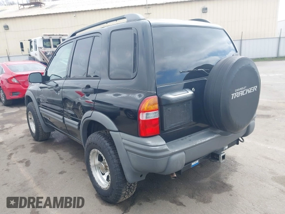 2003 Chevrolet Tracker ZR2 with VIN 2CNBJ734536931923, listed as a IAAI auction lot 41641054 with 111,247 mi miles and . Bid and sale history available at DreamBid. Image 3.