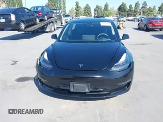 2021 Tesla Model 3 Standard Range Plus z VIN 5YJ3E1EA5MF939299, wystawiony jako IAAI lot #42146702 z przebiegiem 43 382 mil mil oraz . Historia ofert i sprzedaży dostępna na DreamBid. Obrazek 19.