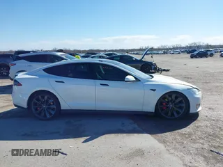 2015 Tesla Model S 85D with VIN 5YJSA1H48FF082038, listed as a IAAI auction lot 41712242 with 58,297 mi miles. Bid and sale history available at carsss.com. Image 13.