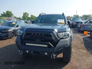 2017 Toyota Tacoma SR5 with VIN 3TMCZ5ANXHM099610, listed as a IAAI auction lot 42441050 with 85,046 mi miles and . Bid and sale history available at DreamBid. Image 6.