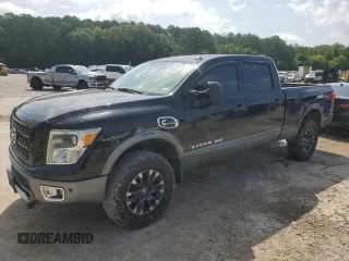 2016 Nissan Titan Platinum Reserve with VIN 1N6BA1F40GN512437, listed as a Copart auction lot 63521325 with 203,879 mi miles and Clean title. Bid and sale history available at DreamBid. Image 1.