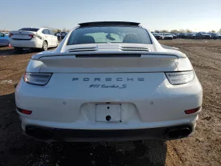 2015 Porsche 911 Turbo S with VIN WP0AD2A9XFS160370, listed as a Copart auction lot 77165054 with 19,235 mi miles and Salvage Title. Bid and sale history available at DreamBid. Image 6.