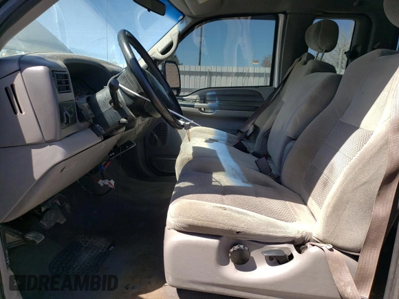 2001 Ford F-250 XL with VIN 1FTNX21F11ED05348, listed as a Copart auction lot 52098155 with 217,678 mi miles and Salvage Title. Bid and sale history available at DreamBid. Image 7.