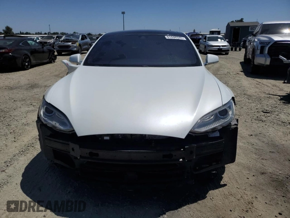 2014 Tesla Model S 60 with VIN 5YJSA1H19EFP58677, listed as a Copart auction lot 61446345 with 150,152 mi miles and Salvage title. Bid and sale history available at DreamBid. Image 5.