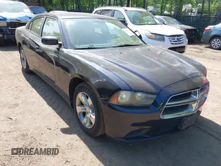 2012 Dodge Charger SE with VIN 2C3CDXBGXCH298176, listed as a IAAI auction lot 42138725 with 128,717 mi miles. Bid and sale history available at carsss.com. Image 1.