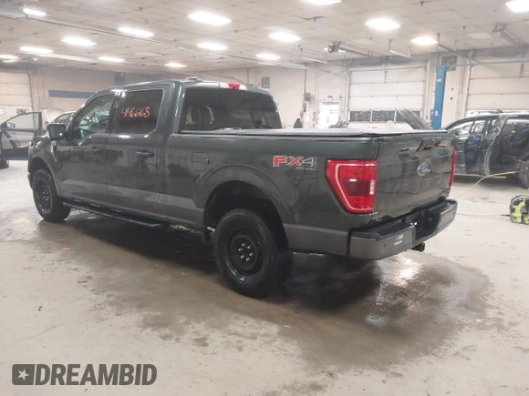 2021 Ford F-150 XL with VIN 1FTFW1E59MKD82204, listed as a IAAI auction lot 41466186 with 56,839 mi miles. Bid and sale history available at carsss.com. Image 3.