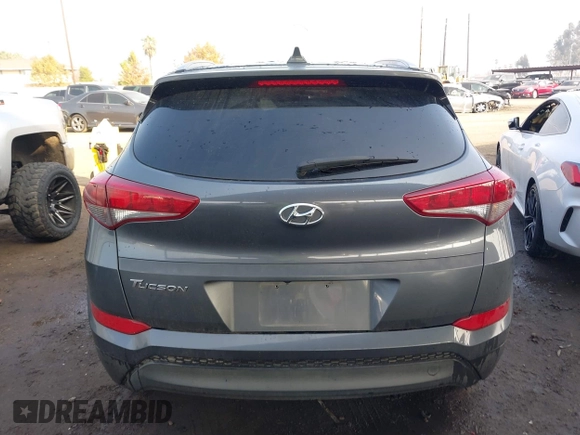 2018 Hyundai Tucson SEL with VIN KM8J33A47JU768935, listed as a IAAI auction lot 41007821 with 125,678 mi miles. Bid and sale history available at carsss.com. Image 16.