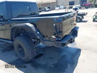 2020 Jeep Gladiator Sport S with VIN 1C6HJTAGXLL123540, listed as a IAAI auction lot 42453999 with 27,855 mi miles and . Bid and sale history available at DreamBid. Image 6.