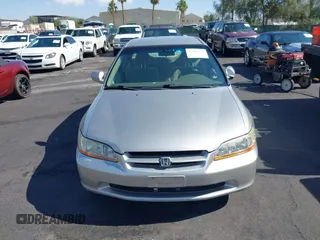 1999 Honda Accord LX with VIN JHMCG6650XC011621, listed as a IAAI auction lot 42401527 with 243,227 mi miles and . Bid and sale history available at DreamBid. Image 6.
