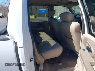 2003 Ford F-150 XLT with VIN 1FTRW07663KD57580, listed as a IAAI auction lot 41870643 with 256,497 mi miles. Bid and sale history available at carsss.com. Image 8.