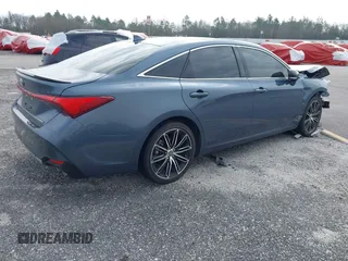 2022 Toyota Avalon Touring z VIN 4T1HZ1FB3NU088304, wystawiony jako IAAI lot #36419998 z przebiegiem 14 956 mil mil oraz . Historia ofert i sprzedaży dostępna na DreamBid. Obrazek 4.