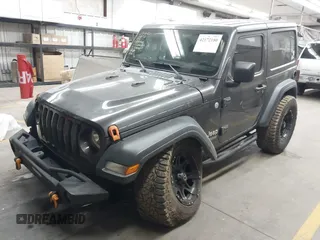 2020 Jeep Wrangler Sport S with VIN 1C4GJXAN4LW229040, listed as a IAAI auction lot 42172180 with 58,701 mi miles and . Bid and sale history available at DreamBid. Image 17.