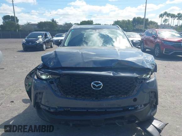 2024 Mazda CX-50 S Premium Plus z VIN 7MMVABEM4RN171943, wystawiony jako IAAI lot #41839219 z przebiegiem 13 733 mil mil oraz . Historia ofert i sprzedaży dostępna na DreamBid. Obrazek 13.