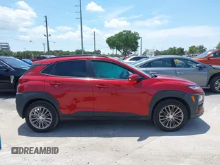 2021 Hyundai Kona SEL with VIN KM8K22AA8MU601480, listed as a IAAI auction lot 39589701 with 55,876 mi miles and . Bid and sale history available at carsss.com. Image 13.