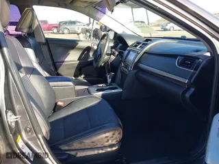 2014 Toyota Camry Hybrid LE with VIN 4T1BD1FK8EU135234, listed as a IAAI auction lot 41399246 with 104,964 mi miles. Bid and sale history available at carsss.com. Image 5.