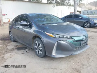 2018 Toyota Prius Plus with VIN JTDKARFPXJ3104302, listed as a IAAI auction lot 42127312 with 87,531 mi miles and . Bid and sale history available at DreamBid. Image 1.