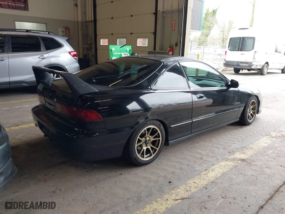 1999 Acura Integra GS-R with VIN JH4DC2397XS001674, listed as a IAAI auction lot 41857042 with 205,494 mi miles. Bid and sale history available at carsss.com. Image 4.