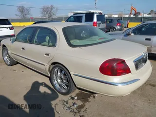 2002 Lincoln Continental with VIN 1LNHM97V22Y672557, listed as a IAAI auction lot 41442390 with 179,198 mi miles. Bid and sale history available at carsss.com. Image 3.
