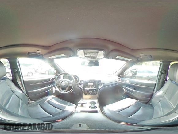 2015 Jeep Grand Cherokee Summit z VIN 1C4RJEJG7FC185426, wystawiony jako Copart lot #62562735 z przebiegiem 133 418 mil mil oraz Szkoda całkowita • Salvage title. Historia ofert i sprzedaży dostępna na DreamBid. Obrazek 16.