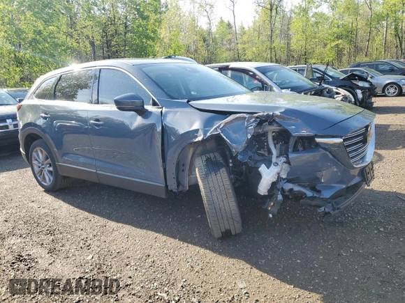 2023 Mazda CX-9 Touring z VIN JM3TCBCYXP0650893, wystawiony jako Copart lot #56875635 z przebiegiem 30 055 mil mil oraz Czysty tytuł • Clean title. Historia ofert i sprzedaży dostępna na DreamBid. Obrazek 4.