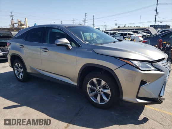 2019 Lexus RX 350 with VIN 2T2ZZMCA9KC143204, listed as a Copart auction lot 59530255 with 60,591 mi miles and Salvage title. Bid and sale history available at DreamBid. Image 4.