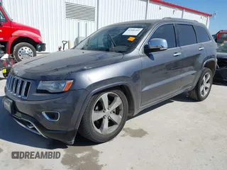 2015 Jeep Grand Cherokee Overland with VIN 1C4RJECT2FC648292, listed as a IAAI auction lot 41806402 with 116,766 mi miles. Bid and sale history available at carsss.com. Image 18.
