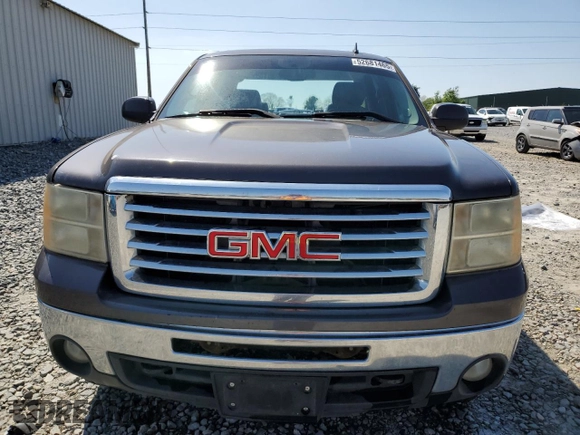 2010 GMC Sierra 1500 SLT with VIN 3GTRKWE38AG160082, listed as a Copart auction lot 52681465 with 251,363 mi miles and Salvage title. Bid and sale history available at DreamBid. Image 5.