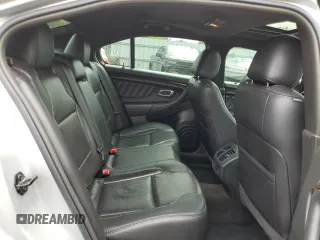 2013 Ford Taurus Limited z VIN 1FAHP2F89DG174546, wystawiony jako Copart lot #61003745 z przebiegiem 140 919 mil mil oraz Czysty tytuł • Clean title. Historia ofert i sprzedaży dostępna na DreamBid. Obrazek 10.