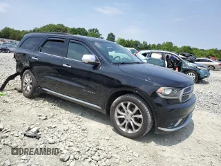 2017 Dodge Durango Citadel Anodized Platinum with VIN 1C4RDHEG5HC774691, listed as a Copart auction lot 57885025 with 176,240 mi miles and Salvage title. Bid and sale history available at DreamBid. Image 4.